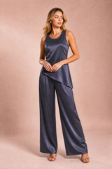 Conjunto de top asimétrico sin mangas y pantalón