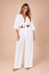 Conjunto crop top anudado y pantalón ancho