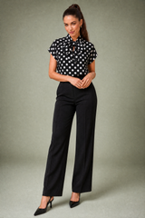 Blusa de lunares con lazo al cuello