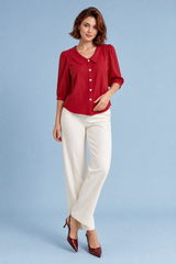 Blusa de cuello redondo y mangas abullonadas