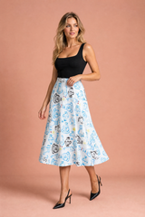 Falda midi blanca fluida estampada