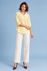 Blusa de cuello redondo y mangas abullonadas
