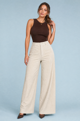Pantalón de pana de pernera ancha y cintura alta