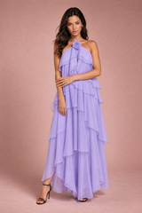 Vestido largo de espalda descubierta con volantes