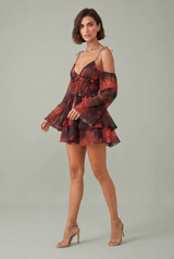 Vestido corto fluido con estampado floral, tirantes anudados y volantes