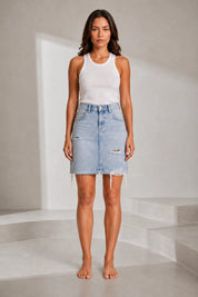 Jupe en jean bleu clair déchirée | Lounelle Paris