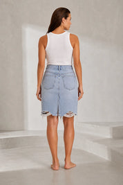 Jupe en jean bleu clair déchirée | Lounelle Paris