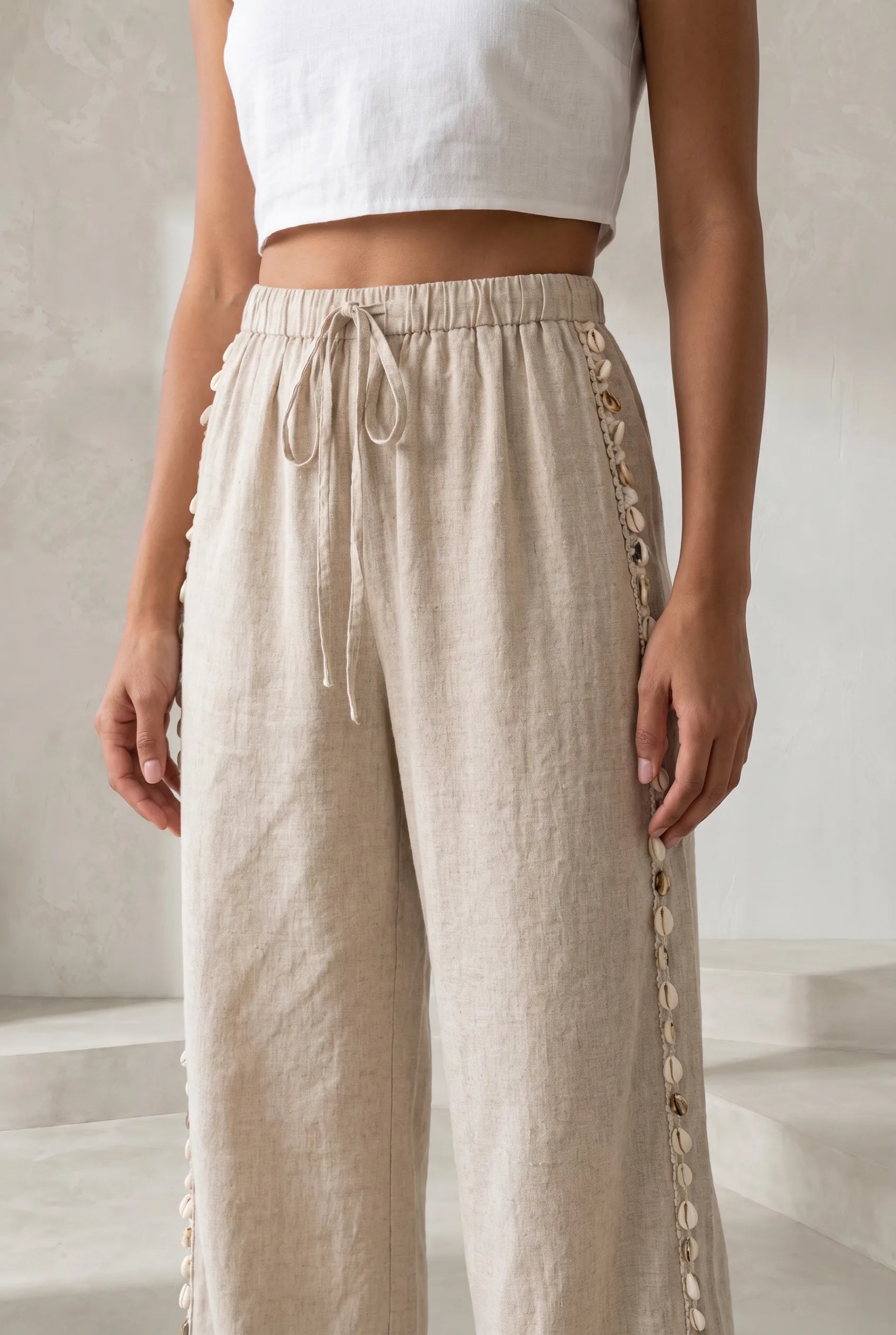 Pantalon large beige à coquillages | Lounelle Paris
