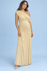 Vestido premamá largo beige de cuello asimétrico y cintura caída