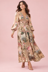 Vestido largo beige con escote en V y mangas abullonadas