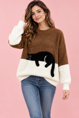 Jersey marrón oversize con estampado de gatos