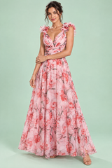 Vestido largo rosa con estampado floral y volantes