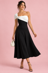Vestido midi negro y blanco de un hombro