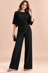 Conjunto negro de pantalón plisado y pierna ancha