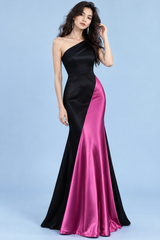 Vestido negro y fucsia de un hombro