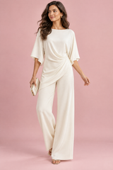 Conjunto blanco roto de pantalón plisado y pierna ancha