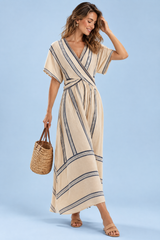 Vestido largo beige cruzado de cuello de pico