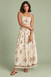 Robe longue écrue fleurie à volants | Vue de face | Lounelle Paris