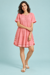 Blusa rosa oversize con botones delanteros
