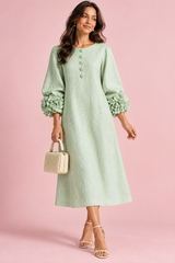 Vestido midi verde menta de corte evasé con mangas abullonadas