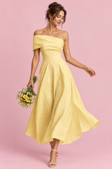 Vestido amarillo asimétrico de hombros descubiertos