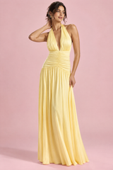 Vestido largo amarillo de escote pronunciado con detalle fruncido