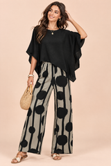 Conjunto negro de pantalón con lunares