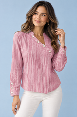 Blusa de rayas rosa con escote asimétrico