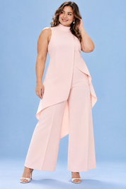 Ensemble pantalon rose fluide avec top sans manches à col montant | Porté sur une silhouette plus ronde | Lounelle Paris