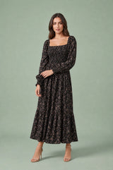 Vestido largo floral con mangas abullonadas